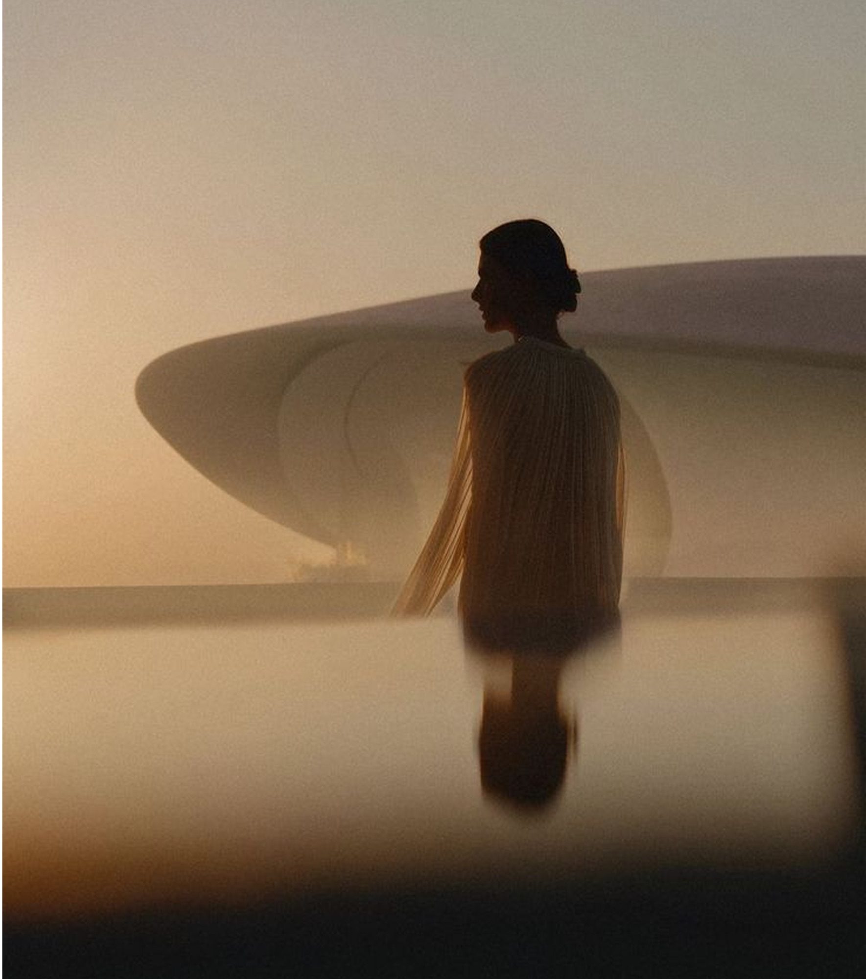 Luxury Hospitality Consulting brand imagery – figure at dusk