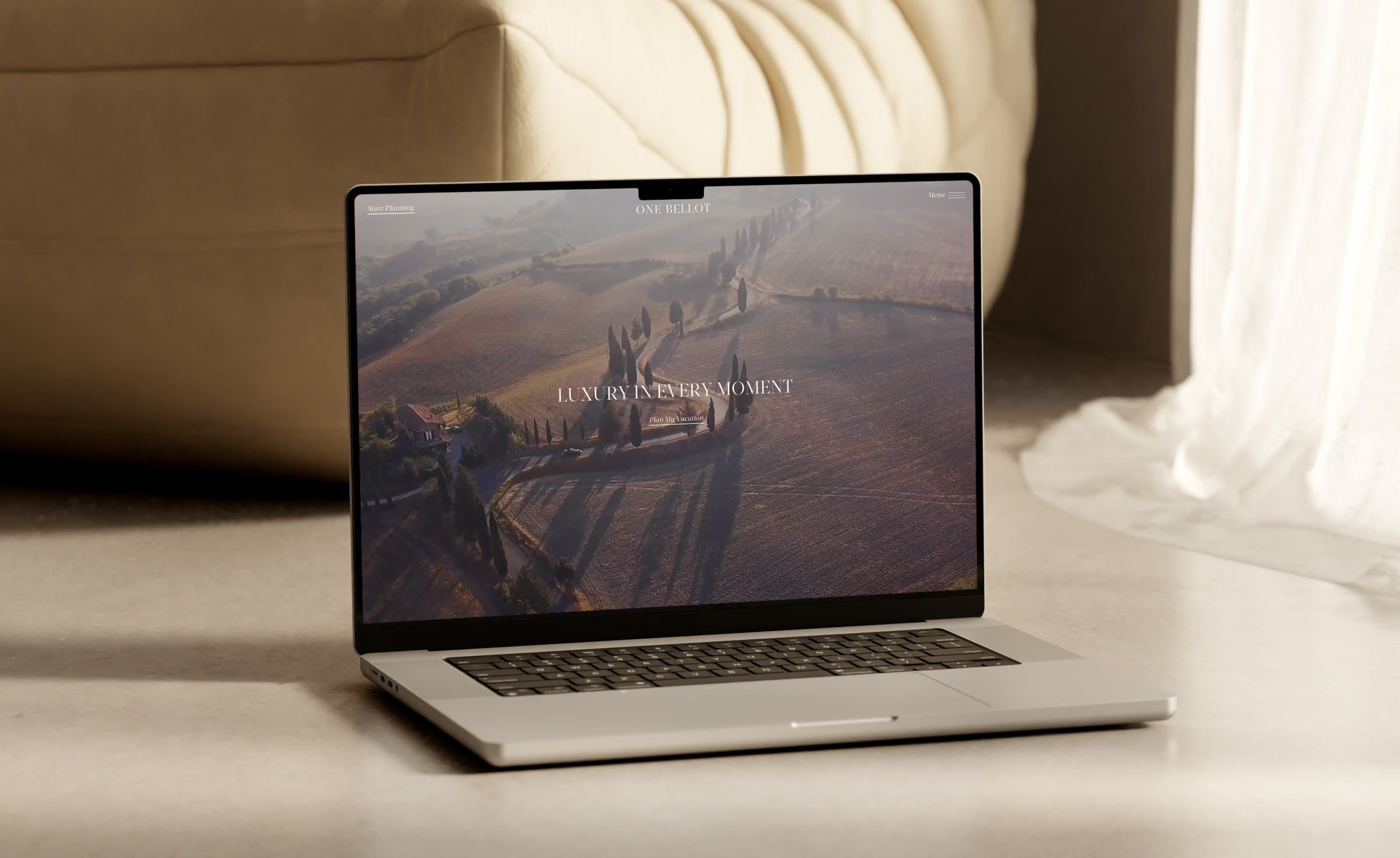 The One Bellot website on a laptop